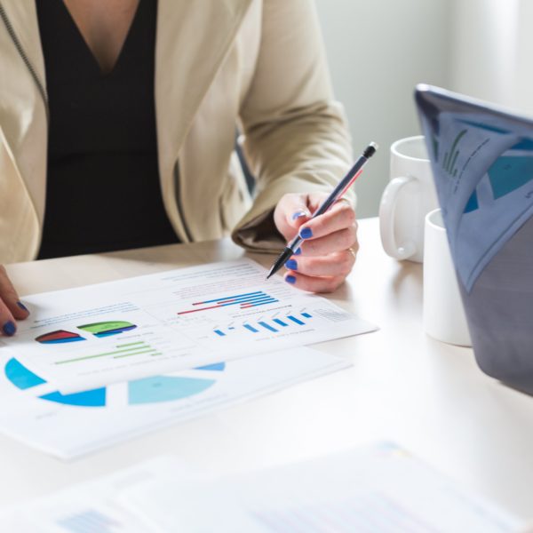 woman reads through meeting info